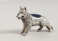 A SILVER HOUND PIN CUSHION.
