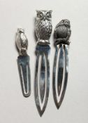THREE SILVER NOVELTY BOOK MARKERS.