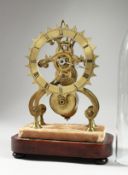 A 19TH CENTURY BRASS SKELETON CLOCK, eight-day movement, the cog shaped chapter ring with