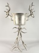A LARGE STAG AND ANTLER SILVER PLATE WINE COOLER.