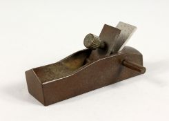A JAPANESE BRONZE PLANE. 3.25ins long.