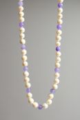 A 14K GOLD, LAVENDER AND PEARL NECKLACE.