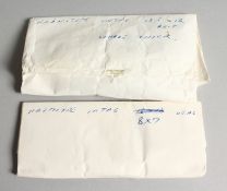 TWO BAGS OF HAEMATITE INTAGLIOS.