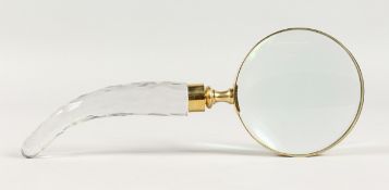A MAGNIFYING GLASS with cut glass handle.