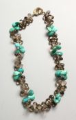 AN IRANIAN TURQUOISE NECKLACE.