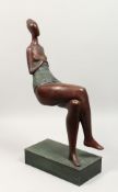 A GOOD TWO-COLOUR BRONZE ABSTRACT FIGURE OF A SEATED FEMALE SEMI-NUDE, on a rectangular base.