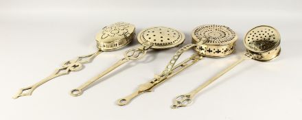 FOUR BRASS CHESTNUT ROASTERS.