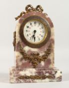 A SMALL VEINED MARBLE CLOCK with ormolu mount. 6.5ins high.