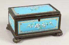 A 19TH CENTURY FRENCH BLUE ENAMEL JEWELLERY BOX, blue ground painted with flowers. 6.5ins long.