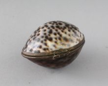 A SMALL SHELL PURSE. 2.5ins.