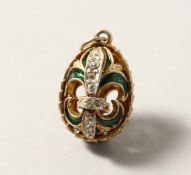 A RUSSIAN SILVER AND ENAMEL EGG.