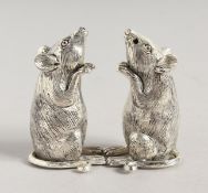 A PAIR OF .925 SILVER PLATE MICE SALT AND PEPPERS. 2.5ins high.