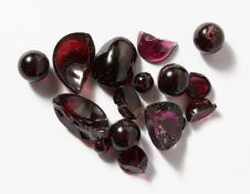 A BAG OF SEMI-PRECIOUS STONES.