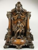 CASPAR BUBERL, SCULPTOR (1834-1899) AMERICAN A SUPERB LARGE BRONZE GROUP of a man sitting in a chair