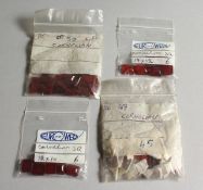 FOUR BAGS OF CARNELIAN.