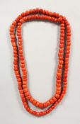 A SUPERB LARGE CORAL SINGLE STRAND NECKLACE. 48ins long. 230gms.