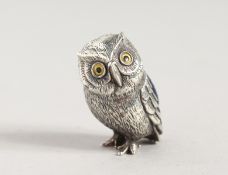 A SILVER OWL PIN CUSHION.