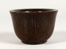 A GOOD CIRCULAR HORN BOWL. Signed. 3.5ins diameter.