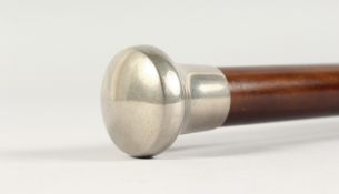 A WALKING CANE with CHROME HANDLE. 2ft 11ins long.