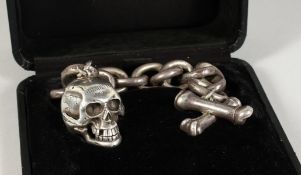 A RARE SILVER MUSICAL SKULL CLOCK, Probably 17th century, with verge movement on a heavy silver