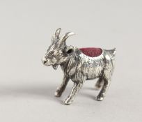 A SILVER GOAT PIN CUSHION.