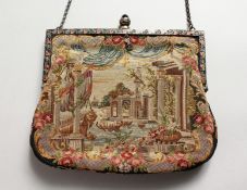 A NEEDLEWORK EVENING BAG.