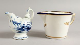 AN 18TH CENTURY DERBY BLUE AND WHITE EWER painted with a Chinese landscape and a Derby cream jug