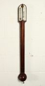 A GOOD STICK BAROMETER by WOODRUFF, MARGATE, with two ivory dials. 36ins long.