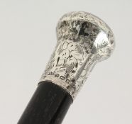 A WALKING CANE with silver top. Birmingham 1926. 3ft long.