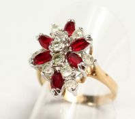 A 9CT GOLD MULTI-STONE RING.