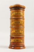 A TREEN FOUR TIER SPICE TOWER, Cloves, Ginger, Mace and Nutmeg. 7.5ins high.