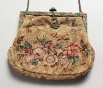 A NEEDLEWORK EVENING BAG.