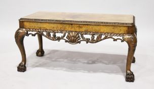 A GOOD FIGURED WALNUT RECTANGULAR COFFEE TABLE, with pierced sides on cabriole legs, on claw and