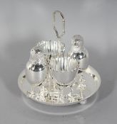 A CHICKEN AND EGG CUP CRUET.