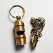 TWO BRASS WHISTLES.