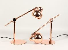 A GOOD SMALL PAIR OF COPPERED ANGLEPOISE LAMPS.