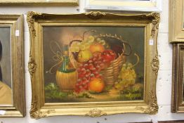 A still life of fruit in a basket with a Chianti bottle, oil on canvas.