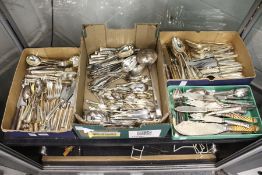 A large quantity of plated flatware.