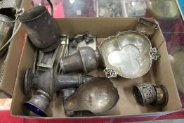 A box of assorted silver.