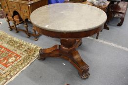A good 19th century mahogany and marble top circular centre table on a bulbous octagonal shaped