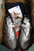 A pair of running spikes signed by Colin Jackson together with a signed photograph.