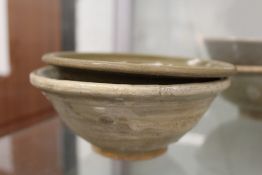 Two early Chinese glazed terracotta bowls.