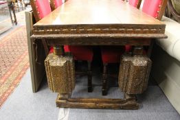 A good large substantial Jacobean revival oak dining table.