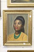 A bust length portrait of a young lady wearing a green bead necklace, oil on canvas.