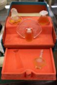 A small Lalique gift set comprising folding box fitted with three scent bottles.