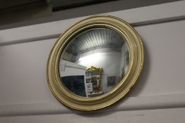 A convex wall mirror.