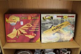 Two limited edition die cast models of aeroplanes, boxed.