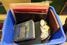 Stamp albums and loose stamps.