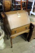 A small oak bureau.