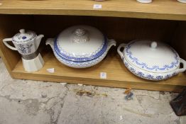 Two vegetable dishes and a coffee pot.